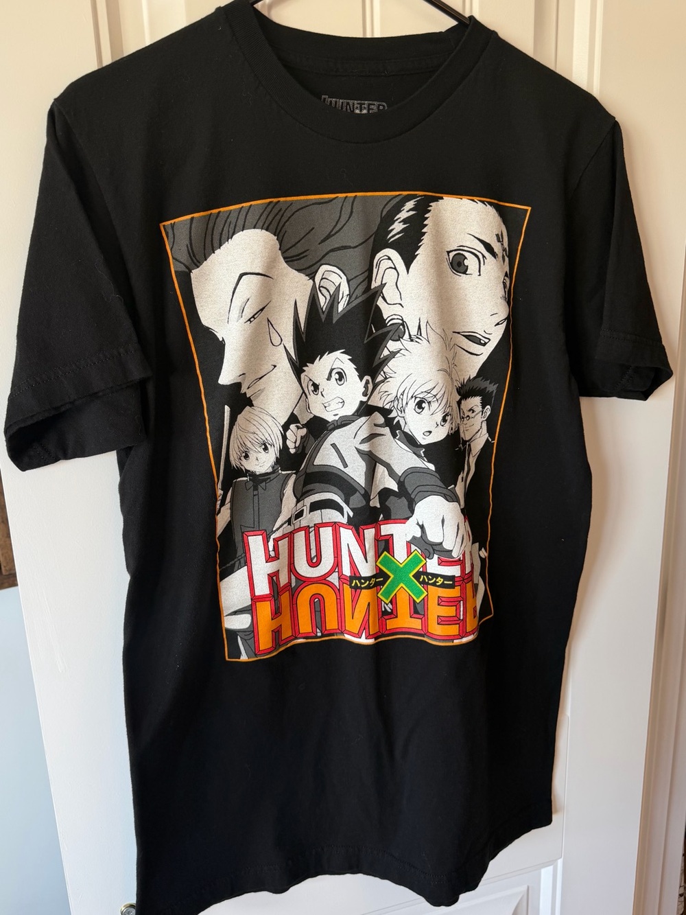 Hunter Black Anime Group Graphic Tee with Red and Orange Accents